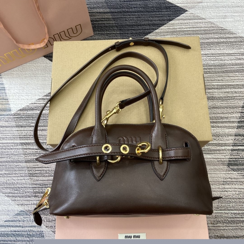 G*u*i top handle bags